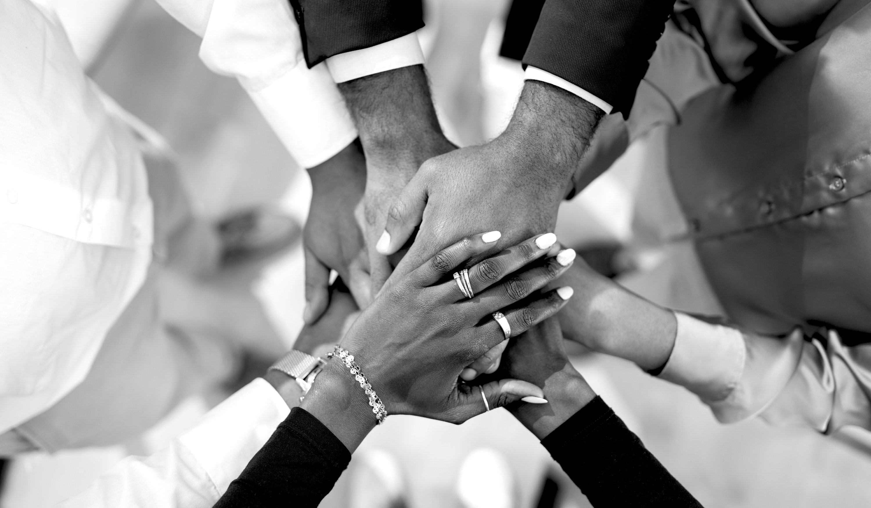 A team of professionals working together, symbolising the collective effort required for brand awareness.